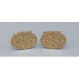A pair of 14ct gold and Diamond set cufflinks, each set with four diamonds within engraved