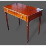 A 19th Century mahogany side table, the reeded top above a frieze drawer raised upon ring turned