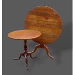 A 19th Century mahogany pedestal table together with an oak tilt top table