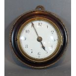 A 19th Century circular wall clock, the enamel dial with Arabic numerals, the engraved movement