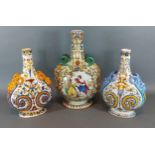 A pair of French Faience bottle neck vases stamped Gien, 27cms tall together with another similar