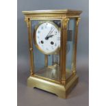 A late 19th Century French library clock, the enamel dial with Arabic numerals, 26.5cms tall