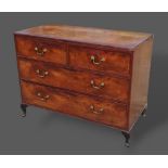 A 19th Century mahogany chest of two short and two long drawers raised upon low cabriole legs,