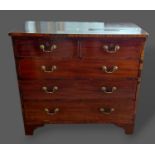 A 19th Century mahogany converted chest with a lift up front simulating five drawers, raised upon