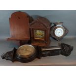 An Edwardian walnut bracket clock with wall bracket together with an oak barometer/thermometer and