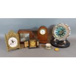 A travelling alarm clock by F. Horstmann, Guildford together with a collection of clocks