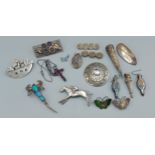 Two silver Posy holders together with a silver Opal set brooch in the form of a Scorpion and other