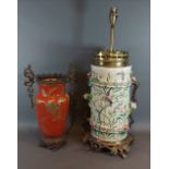 A Victorian pottery and gilt metal mounted table lamp, 60cms tall together with a similar two