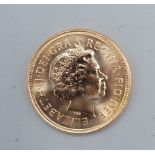 A Queen Elizabeth II full gold Sovereign dated 2000
