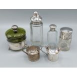 A pair of Birmingham silver mustards together with a silver mounted sugar caster and three silver