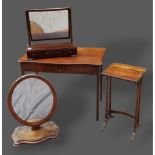 A French mahogany oval table mirror together with a mahogany toilet mirror, a brass inlaid