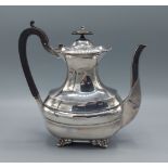 An Edwardian silver coffee pot with shaped ebonised handle, Birmingham 1906, Elkington and Co. 22ozs