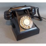 An early 20th Century Bakelite telephone