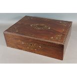 A 19th Century French rosewood, brass and Mother Of Pearl inlaid dressing box, the hinged cover