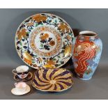 An Imari dish decorated in polychrome enamels, 40cms diameter together with a Japanese vase, A
