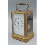 Bolviller A Paris and Japy Freres, a brass cased carriage clock, the engraved case with enamel