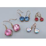 A pair of 9ct gold red Topaz set earrings together with three other pairs of 9ct gold Topaz set