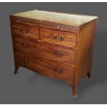 A 19th Century mahogany low chest with a brushing slide above two short and two long drawers