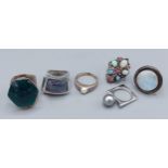 A collection of six silver dress rings to include Opal set
