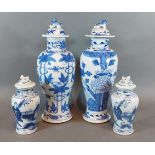 Two 19th Century Chinese covered vases decorated underglaze blue, 27cms tall together with a similar