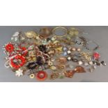 A collection of jewellery to include necklaces, bracelets, ear clips and other items of jewellery