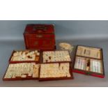 A bone and bamboo Mahjong set within box, together with another similar cased set and a collection