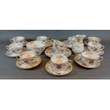 A Royal Worcester Peking pattern part tea service, comprising of eleven cups, seven saucers, three