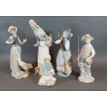 A Lladro porcelain model in the form of a fisherman together with four Lladro porcelain figures