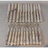 A matched set twelve silver and silver handled dessert knives and forks, 40ozs all in