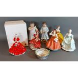 A Royal Doulton figurine Top O The Hill HN 1834, together with another Royal Doulton figurine, three