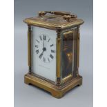 A brass cased Carriage clock retailed by Mappin and Webb with lever escapement