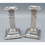 A pair of Victorian silver dwarf candlesticks of Corinthian form, Birmingham 1898, 14.5cms tall