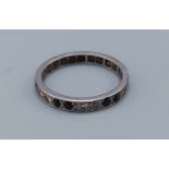A white gold diamond and sapphire full eternity ring, 3gms, ring size N