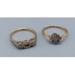 An 18ct gold diamond cluster ring together with another 18ct gold dress ring, 3.9gms, ring size I