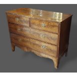 A 19th Century mahogany chest of two short and two long drawers raised upon bracket feet, 108cms