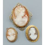 A cameo brooch with 9ct gold frame of pierced form together with another cameo brooch with 9ct