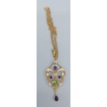 A 9ct gold pendant set with pearls, amethyst and peridot with 9ct gold linked chain, 5.2gms