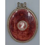 A 19th Century circular portrait miniature, portrait of a lady with diamond chip border, all