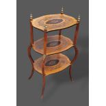 A 19th Century French marquetry inlaid three tier Etagere of shaped form with shaped cabriole