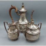 A Portuguese 833 silver three piece coffee service comprising coffee pot, two handled covered