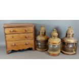A 19th Century mahogany apprentice chest together with a set of three ships lamps
