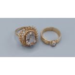 A 9ct gold dress ring set large oval stone together with a 9ct gold solitaire ring, 8.8gms, ring