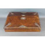 A Victorian Rosewood and M.O.P. inlaid writing slope, the hinged top enclosing a fitted interior