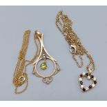 A 9ct gold pendant set with seed pearls and peridot drop with 9ct gold linked chain together with