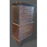 A 19th Century mahogany secretaire chest on chest, the moulded cornice above two short and six