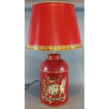 A Toleware table lamp, with gilded decoration on a red ground, complete with Toleware shade, 71cms