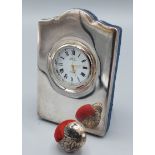 A 925 silver table clock together with a London silver pin cushion in the form of a bird