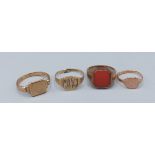 A 9ct gold stone set signet ring together with three 9ct gold signet rings, 16.7gms