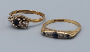 An 18ct gold sapphire and diamond ring, 2.2gms together with a 9ct gold crossover dress ring, 2gms