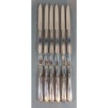 A set of six Sheffield silver dessert knifes and forks by James Dixon & Sons Ltd, 15ozs